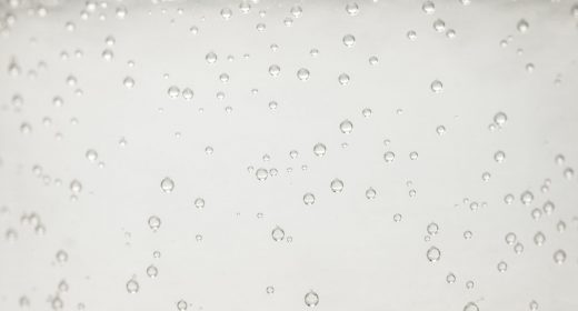 close up view of mineral water with bubbles
